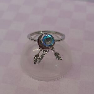 Fragrant Jewels Silver Ring with Blue-Green Iridescent Stone and Feather Charms